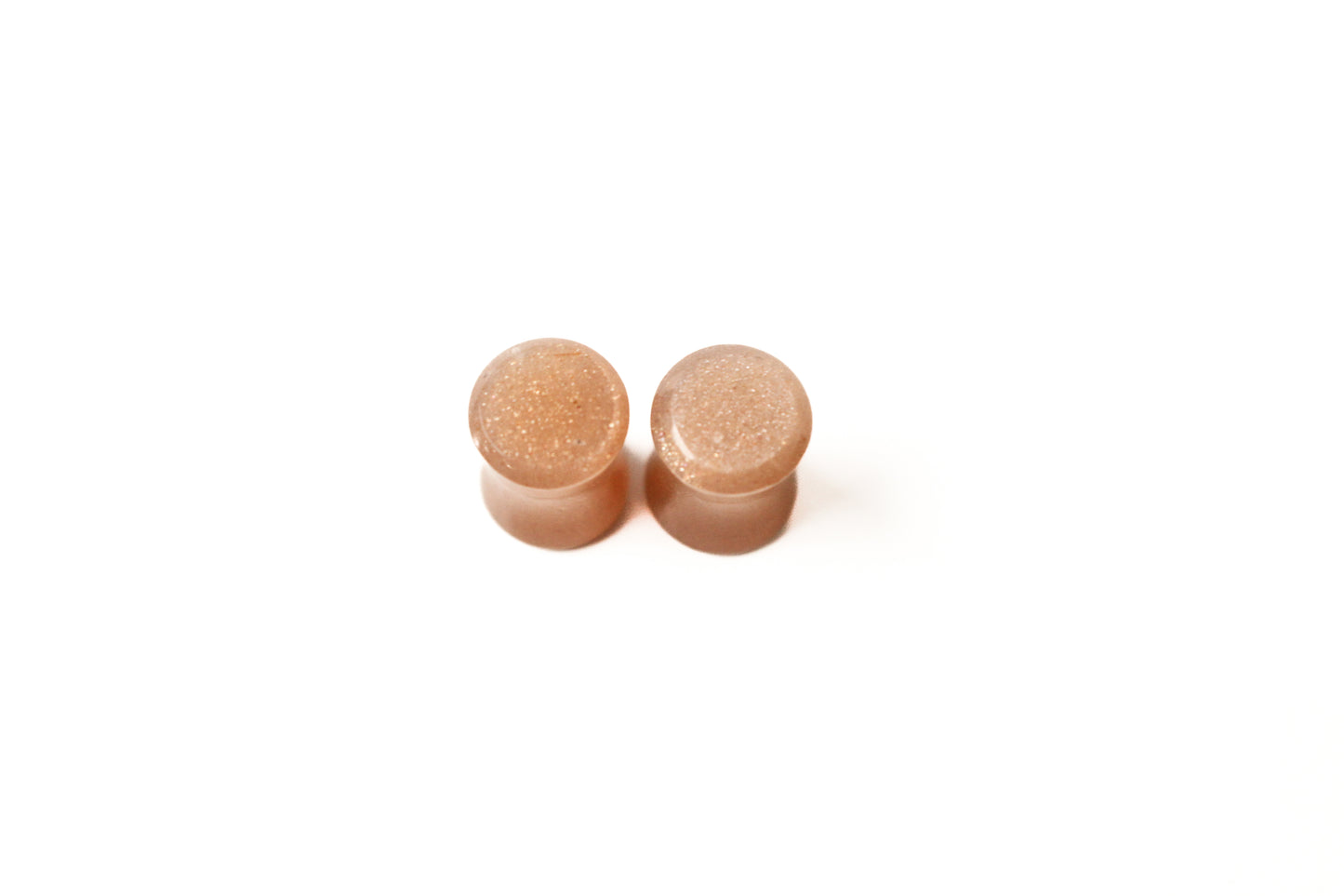 0G (8mm) - Hand Carved India Sunstone Double Flare Plugs