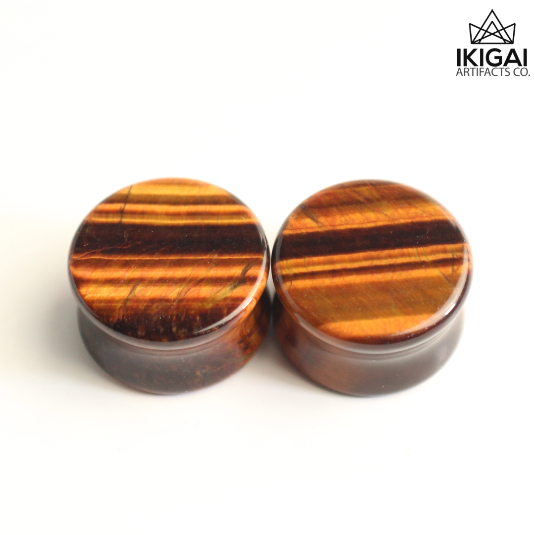 3/4" (19mm) - Red Tigers Eye Double Flare Plugs